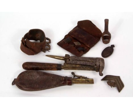 Mixed Lot: leather pouch containing a quantity of knapped firearm flints, together with a leather and brass shot flask, furth