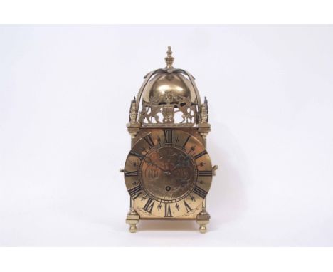 Mid-20th century cast brass mantel timepiece with passing strike and modelled in the form of a lantern clock, signed John Mya