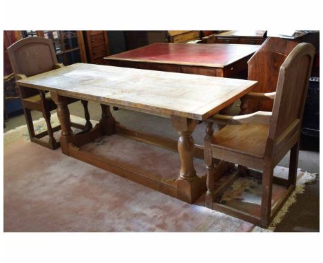 20th century light oak refectory type table with planked top on four turned supports, together with a further pair of oak car