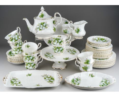 A Royal Albert Trillum pattern part tea set to include: teapot, 9 tea cups, 12 side plates, 8 lunch plates, 3 saucers, tazza 