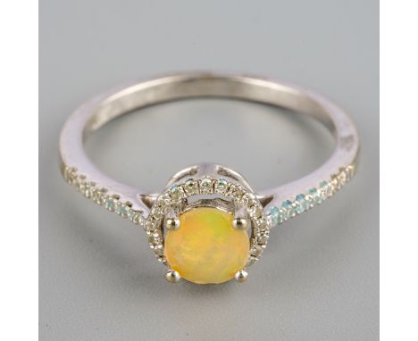 An opal and diamond dress ring, set with a faceted opal and single cut diamonds, stamped 14k, weight 2.1 grams.