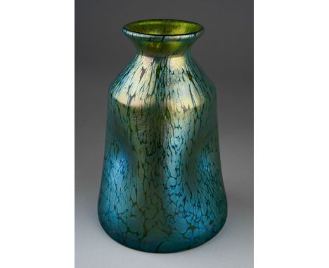 A Loetz style iridescent vase, the flared rim over pinched in body, unmarked, height 11.5cm