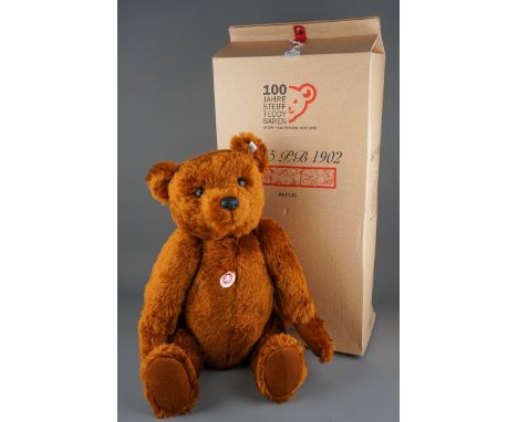 A Steiff 1902 Replica brown Teddy Bear, 55cm long, button and white tag no: 02520 with certificate, tag to chest, in original