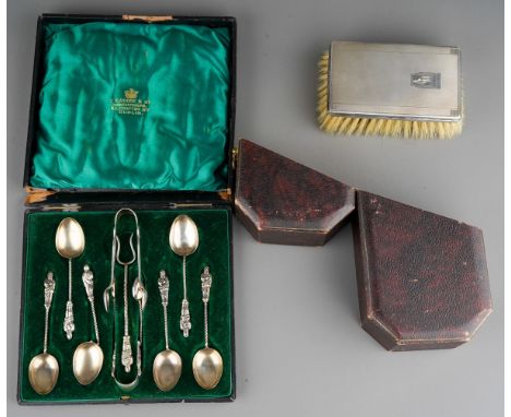 A cased set of six Late Victorian silver apostle top teaspoons with matching sugar tongs (incomplete and damaged) and a cased