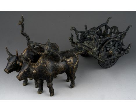 A Kymer style bronze model of Oxen and Cart with figure 