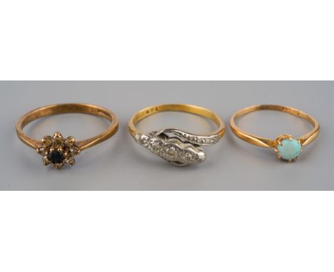 Three gem set and diamond rings, to include an early to mid 20th century 18ct gold Swedish opal cabochon ring, assay marks fo