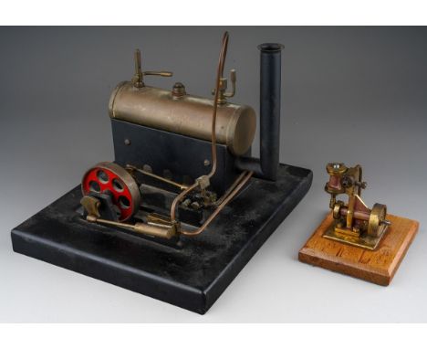 A model live steam engine, lacks, burner, the metal base bearing copper plaque engraved "Roger M Taylor PSF 1980-81", the bas
