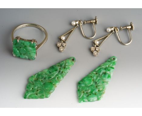 A pair of early to mid 20th century 18ct gold earrings, the screw thread earrings set with seed pearls and single cut diamond
