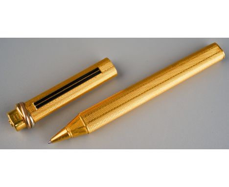 A gold-plated Must de Cartier Vendome Trinity oval ballpoint pen, length approx 13cm, numbered 203422