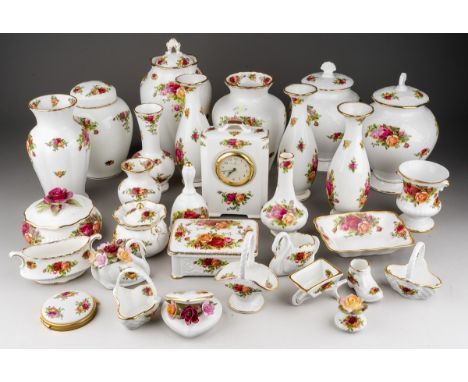 A collection of Royal Albert Old Country Roses gift and ornamental wares, including a pair of ovoid jars and covers, a mantel