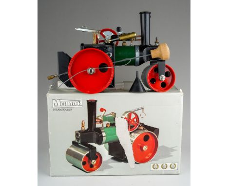 A boxed Mamod Steam Roller, with steering rod, scuttle and funnel, appears to be in little used condition