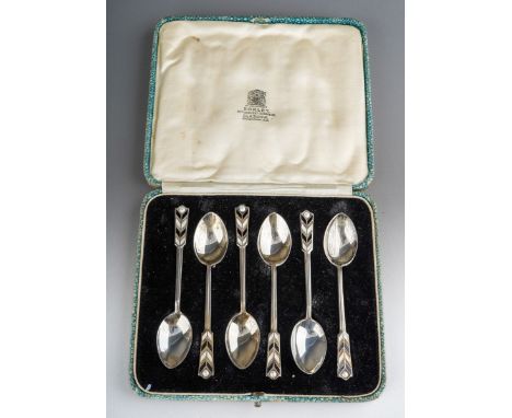 A set of six Arts &amp; Crafts novelty arrow head terminal silver and enamel teaspoons, hallmarked by Roberts &amp; Dore, Bir