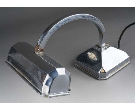 A small Art Deco chrome banker's desk lamp, with adjustable shade and angle adjuster at base, cream bakelite button, shaped s