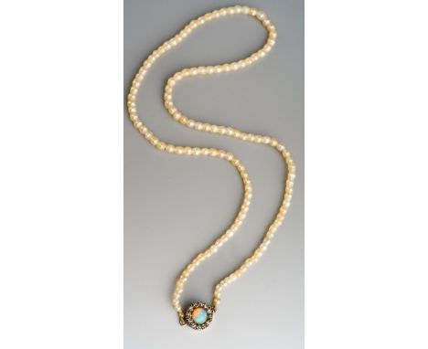 An early 20th century seed pearl necklace with antique opal and rose cut diamond clasp, approx diameter of pearls 3mm, approx