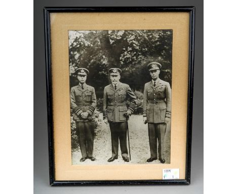After George Moxon; a 1930s group sepia photograph, approx 20 x 15cm of "The Three Kings" in Royal Air Force Uniform with HM 