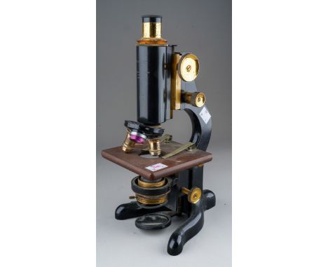 A W. Watson &amp; Sons Ltd of London "Service" microscope, no case, no. 80035, with rack and pinion focusing, three objective