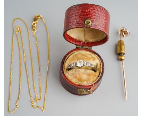 9 ct gold fine chain, 9 ct gold stick pin and 9 ct gold and silver ring. Gross weight 4.5g
