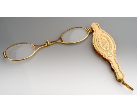 A pair of French 19th century Lorgnettes, with engine turn and foliate detail, initial monogram present, French control marks