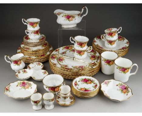A collection of Royal Albert "Old Country Roses" to include: six dinner plates, six lunch / dessert plates, a cake plate, sev