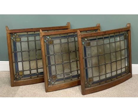 THREE STAINED GLASS WINDOW PANELS, slightly curved oak frames, sash lift type with metal thumb lifts and side bolts, 85 (h) x