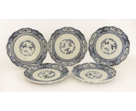 A set of five Japanese plates, 18th century, of floral shape, the centre painted with the Three Winter Friends pattern encirc