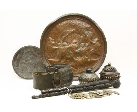 A collection of horse brasses, together with a small collection of Middle Eastern metalware, and a tribal throwing stick, and