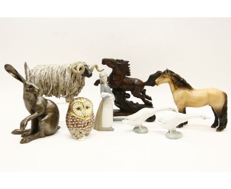 A collection of model animals, to include a Beswick 'Highland' horse and a Royal Crown Derby owl and Lladro figures etc