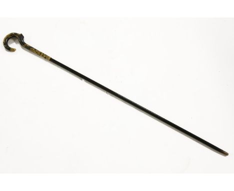 A walking stick, the curved handle decorated in Japanese style with gilt metal bird and foliage (signed?), 91.5cm long