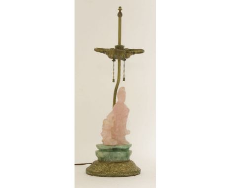 A Chinese rose quartz lady, 20th century, with a ruyi in her arm standing by a phoenix on floret stand, 24cm, now mounted as 