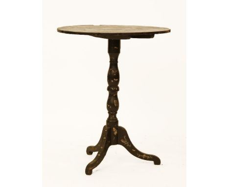 A Victorian black papier mache tripod table with mother of pearl inlaid top