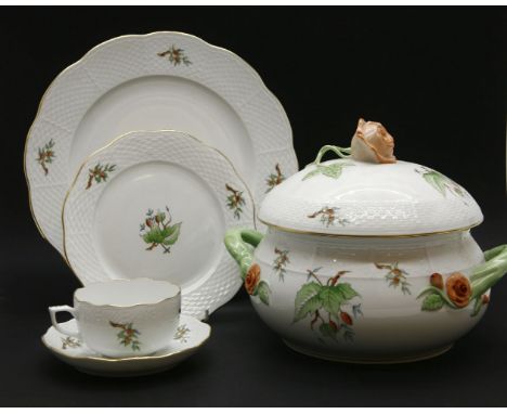 A Herend dinner and tea service, in 'Rosehip' pattern, to include six dinner plates, six bowls, six cups/saucers, six side pl