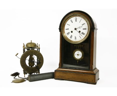 A late Victorian mahogany mantel clock, by Cramerer, Kuss & Co, with a domed case, enamel dial and striking mechanism, 39.5cm