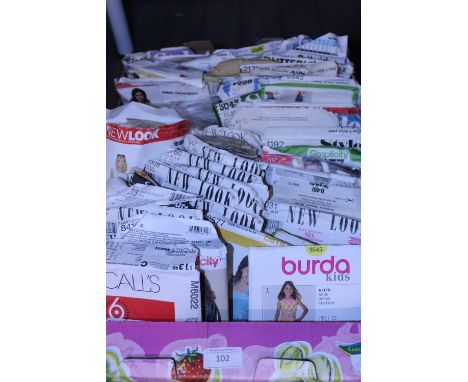 A large job lot of vintage sewing patterns 