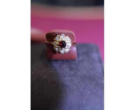 A vintage 9ct gold red and white stone flower ring 2.47g size O 1/2 