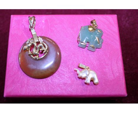 Three vintage pendants (two Jade) 