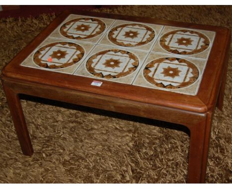 A 1960s teak and tile topped inset coffee table 