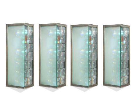 each of the four units containing lenses, a mirror, dichroic films and a screen to react to light and movement (4)each 50 x 2