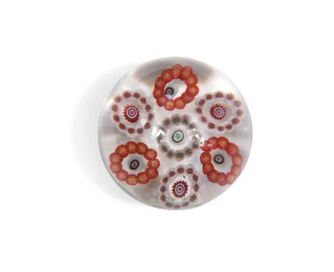 with six alternating pink and white millefiori circlets around a central pale pink circlet7.5cm diameterCondition report: A s