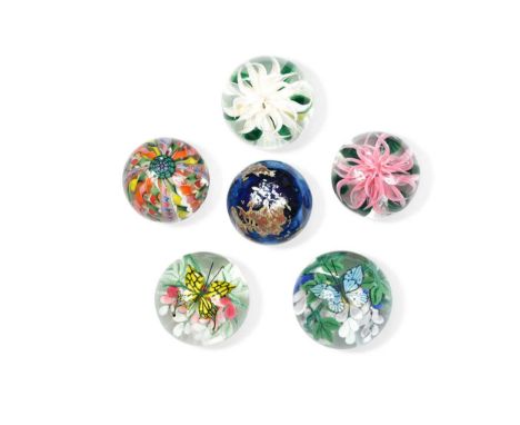 two with lampwork butterflies amidst flowers, with etched marks and each dated 2002, 9.5cm and 8.5cm diameter; two with lampw