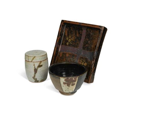 of cylindrical form decorated with tenmoku glaze, impressed seal mark, 11cm high; together with a stoneware octagonal bowl, u
