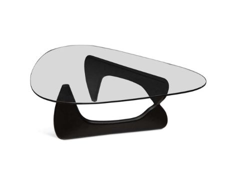 After Isamu Noguchi (1904-1988), a model IN-50 coffee table, the shaped triangular glass top on an ebonised birch base40 x 12