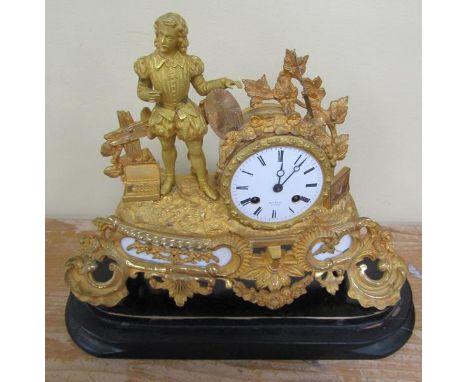 A mid 19c French figural mantel clock. in gilt spelter case with inset white alabaster panels.  The clock depicts an artist i