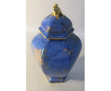 A 1920's Carltonware Kang He Rockery &amp; Pheasant temple jar and cover decorated on a powdered blue ground, 24cm h. 