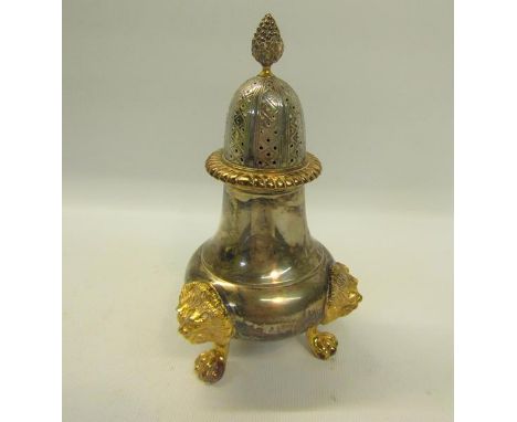 A contemporary mid Georgian style silver sugar shaker with silver gilt highlights including the finial, and gadroon waist to 