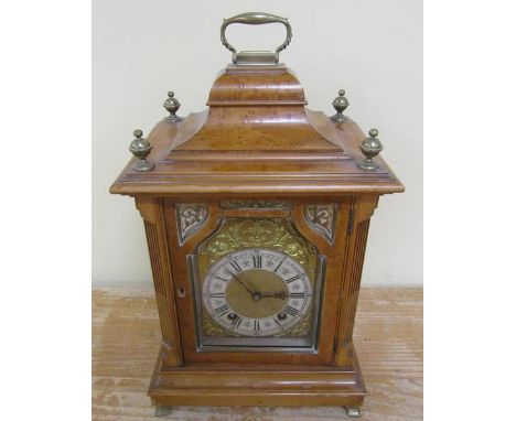 A late 19c German bracket clock by Lenzkirch in burr maple bell top case.  The 12.5cm arched dial is signed for the retailer 