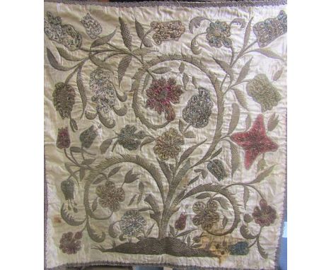 An 18c Flemish tapestry decorated with tulips and other flowers, worked in silk and gilt wire on a cream gold silk background