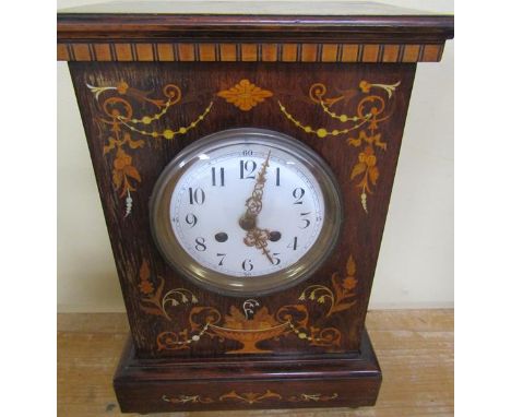 A late 19c French mantel clock in rectangular rosewood case with inlays to front and sides depicting gryphons, swags and armo