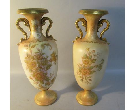 A pair of early 20c Carltonware peony vases decorated on a blush ivory ground with gilt highlights, 31cm h. 