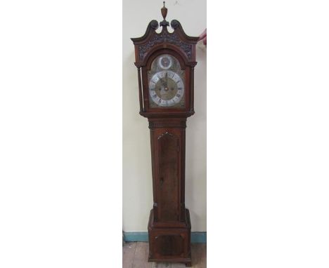 An English Edwardian miniature longcase clock in high quality mahogany case with swan neck pediments to the hood and central 