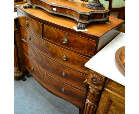 A George III mahogany four height, bow front chest of drawers 